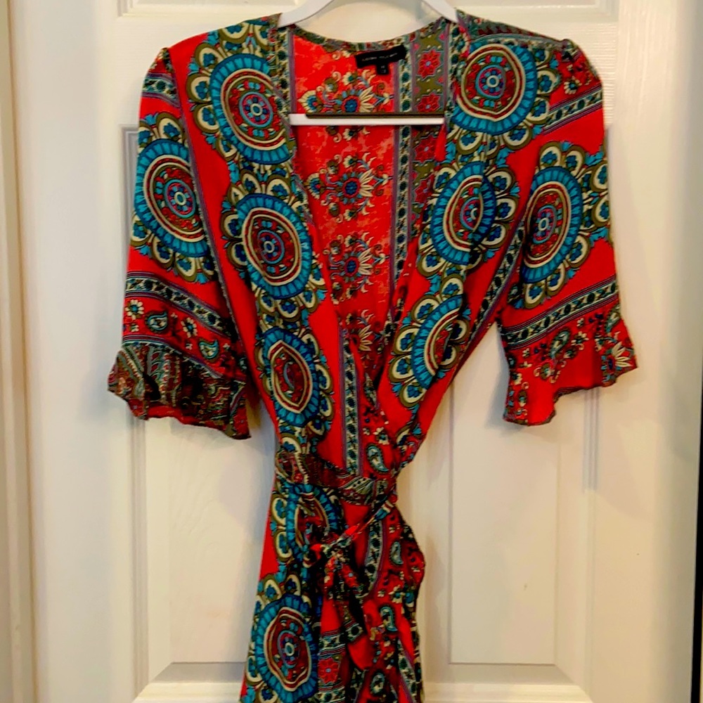 Gorgeous silk like wrap dress.